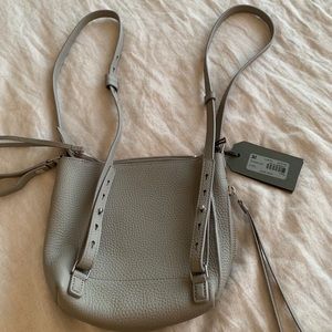 Like new Allsaints mini backpack/purse.